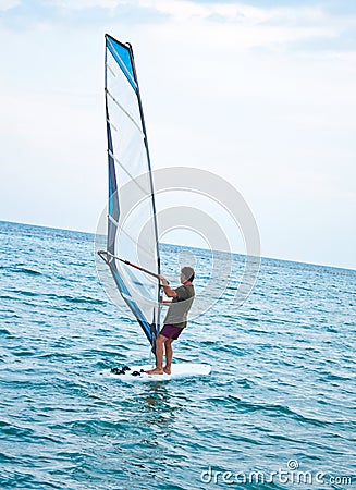 Windsurfer on the sea Stock Photo