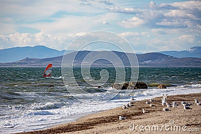 Windsurfer silhouette in Thracian sea at winter Stock Photo