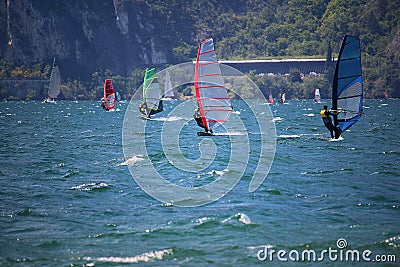 Windsurfers at the European windsurfspot Lake Garda,Torbole, Italy Editorial Stock Photo