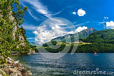 Windsurfers in the lake, Alpnachstadt, Alpnach, Obwalden, Switze Editorial Stock Photo