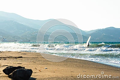 Windsurfers in the sea on Crete on sunset. Windsurfing in Heraklion. Greece Stock Photo