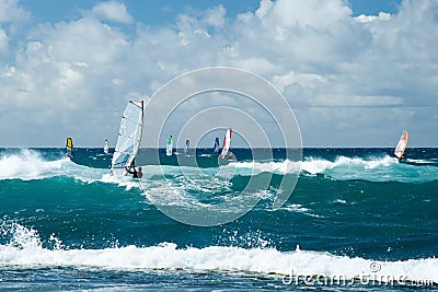 Windsurfers in windy weather on Maui Island Stock Photo