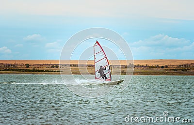 Windsurfing Sport sailing water active leisure Stock Photo