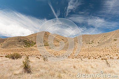 Windswept plains of Lindis Pass Stock Photo