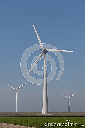 Windturbines producing alternative energy Stock Photo