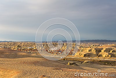 Xinjiang windy city oil field in sunset Stock Photo