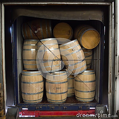 Wine barrels stacked in Truck ,Loading dock, Bordeaux Vineyard Stock Photo