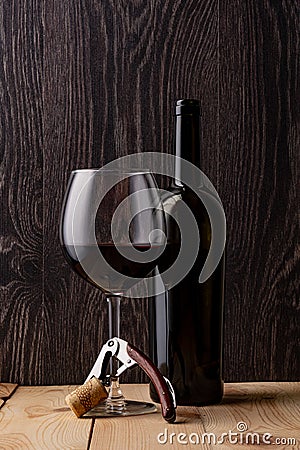 Wine bottle and a glass of wine. Stock Photo