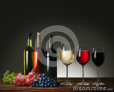 Wine bottles, wine glasses and grapes. Stock Photo