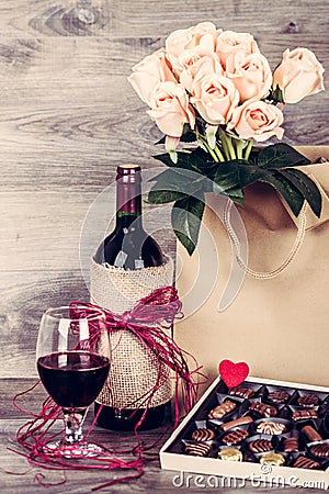 Wine and box of chocolates Stock Photo