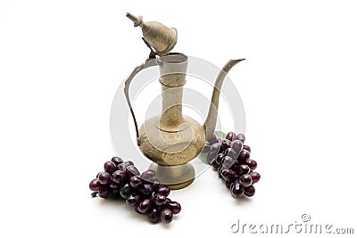 Wine carafe with grapes Stock Photo