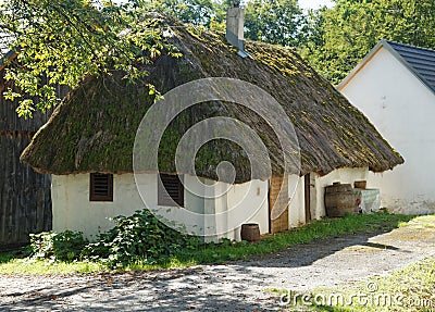 Wine cellar with straw thatched roof Stock Photo