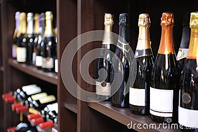 Wine and champagne bottles in liquor store Stock Photo