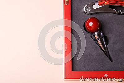 Wine corks and bottle openers set in a wooden box Stock Photo