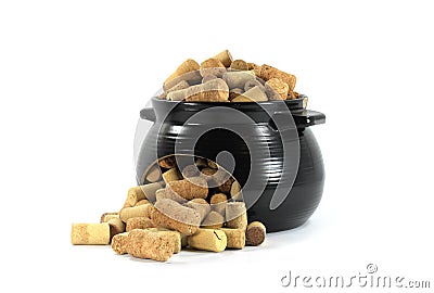 Wine corks and sparkling wine corks in broken ceramic dishes isolated on white background Stock Photo