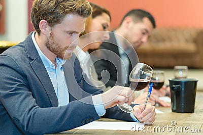 Wine expert specialist tasting glass wine Stock Photo