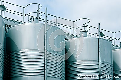 Wine Fermenting in huge vats Stock Photo