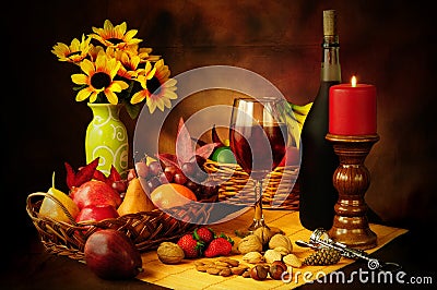 Wine, fruit and nuts still life Stock Photo