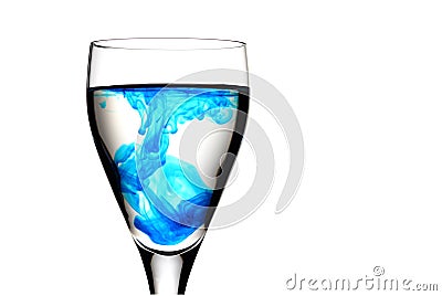 Wine glass with food colouring Stock Photo