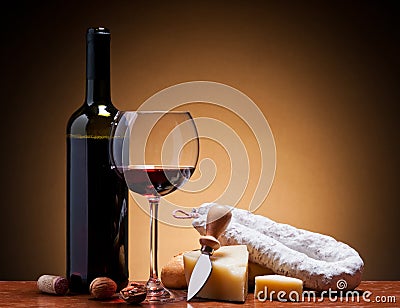 Wine, hard cheese and salami Stock Photo