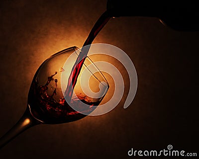 Wine pouring into glass Stock Photo