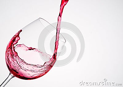 Wine pouring into a glass in diagonal composition Stock Photo