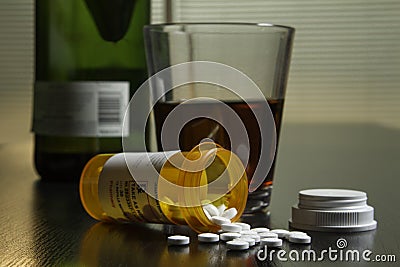 Wine and prescription pills on table, horizontal Stock Photo