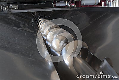 Wine process with grape harvest at working with destemmer machine photo Stock Photo