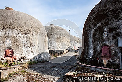 Wine production in huge granite storage tanks, Pinhel, Portugal Stock Photo