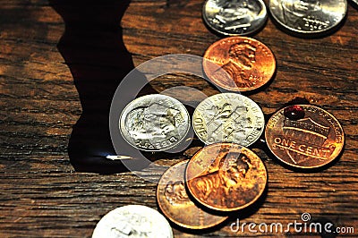 Wine spilled over on to US coins Stock Photo