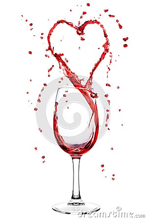 Wine splashing from wineglass in heart shape Stock Photo