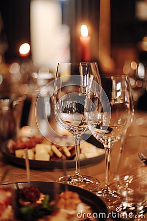 Wine tasting experience in the rustic cellar and wine bar: red wine glass and collection of excellent wines on the Stock Photo
