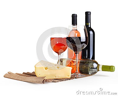Wineglass, bottle of wine, cheese Stock Photo