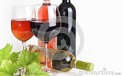 Wineglass, bottle of wine and grapes leaf Stock Photo