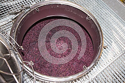 Winemaking vats for fermenting grapes and producing wine at the winery Stock Photo