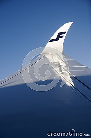 Wing of Finnair airplane Editorial Stock Photo