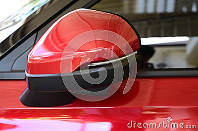 wing mirror of red car, transportation industry Stock Photo