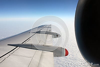 Wing view from a Jet cruising Stock Photo