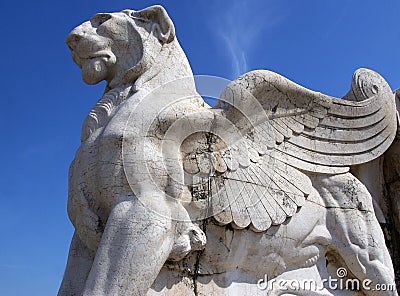 Winged lion sculpture. Stock Photo