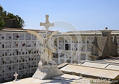 Winged statue in a small cemetary behind the Church of San Giorgio atop a hill in Portofino, Italy. Stock Photo