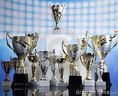 Sport podium, Cups of winners award Stock Photo