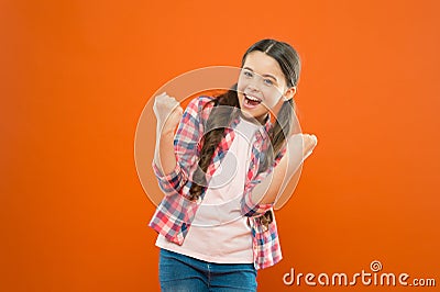 Winners never quit and quitters never win. Successful happy kid. Achieve success. Kid cheerful celebrate victory. Girl Stock Photo