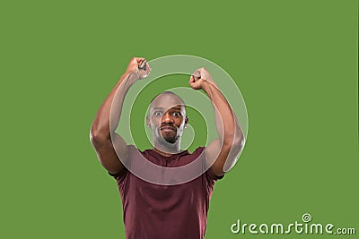 Winning success man happy ecstatic celebrating being a winner. Dynamic energetic image of male model Stock Photo