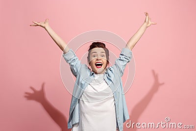 Winning success woman happy ecstatic celebrating being a winner. Dynamic energetic image of female model Stock Photo