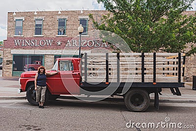 Winslow arizona red flatbed ford with woman Editorial Stock Photo