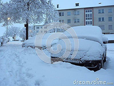 Winter attack in Germany. Heavy snowfall in NRW in the Mettmann county. Snow-covered roads and cars Editorial Stock Photo