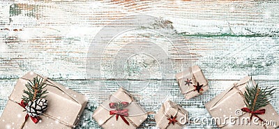 Winter background, with pronounced texture, at the bottom many handmade gifts on white, old wood. Stock Photo