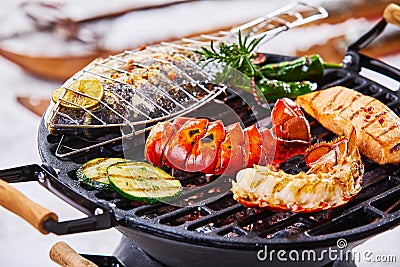 Winter barbecue with gourmet seafood grilling Stock Photo