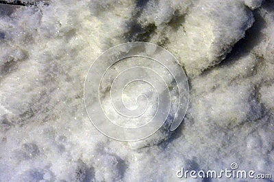 Bright white and ligh snow lies on the ground in the city of Dnipro, Ukraine. Stock Photo