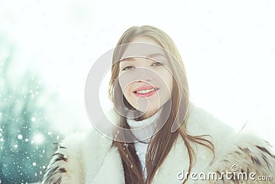 Winter beauty. Beautiful, young and smiling girl Stock Photo